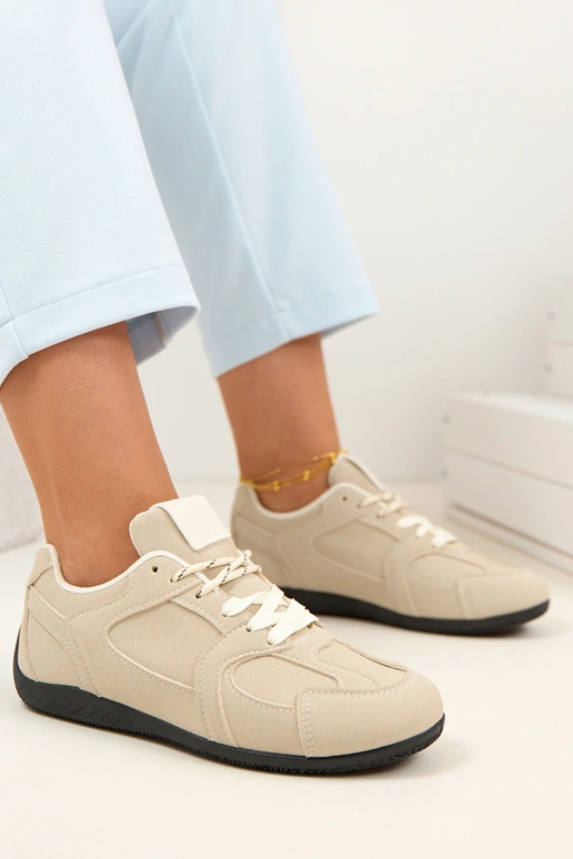 Smėlio spalvos moterų sportbačiai...