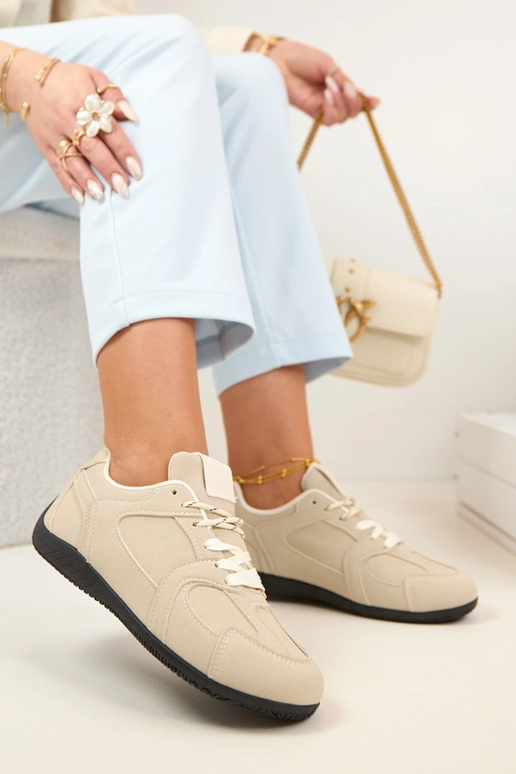 Smėlio spalvos moterų sportbačiai...