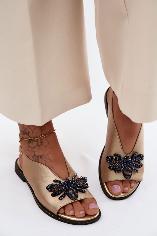 su blizgesiu Moteriškos basutės su ornamentais lygiapadžiai aukso spalvos Russona