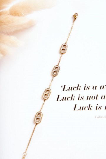 Moteriška apyrankė su tviskančiomis akutėmis aukso spalvos