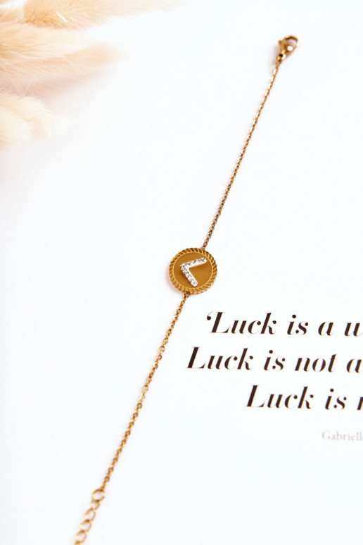 Moteriška apyrankė  su ornamentais ir cirkonio akutėmis aukso spalvos