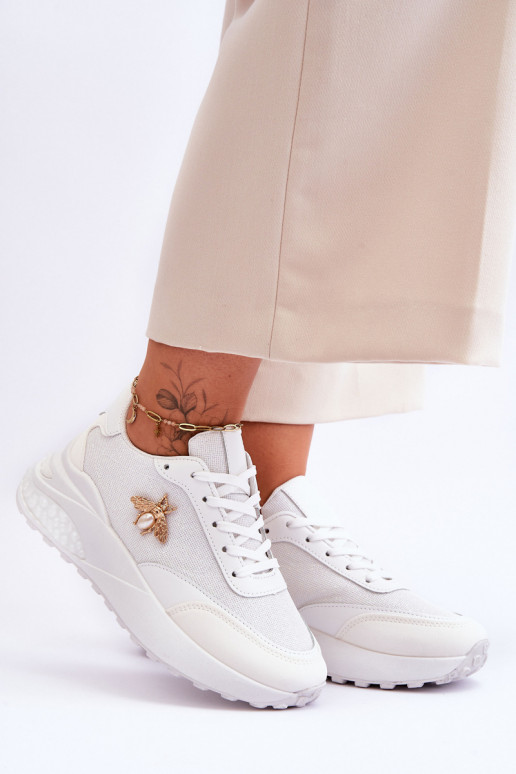 Blizgantys sportiniai bateliai su ornamentais baltos spalvos Seneca