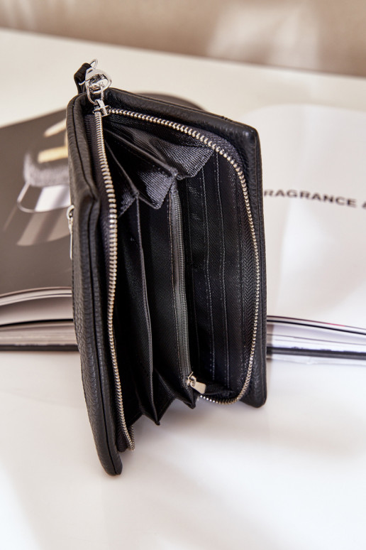 Didelė moteriška piniginė su įspaudu iš eko odos juodos spalvos Tai turirtiel Didelė moteriška piniginė su įspaudu iš eko odos juodos spalvos Tai turirtiel