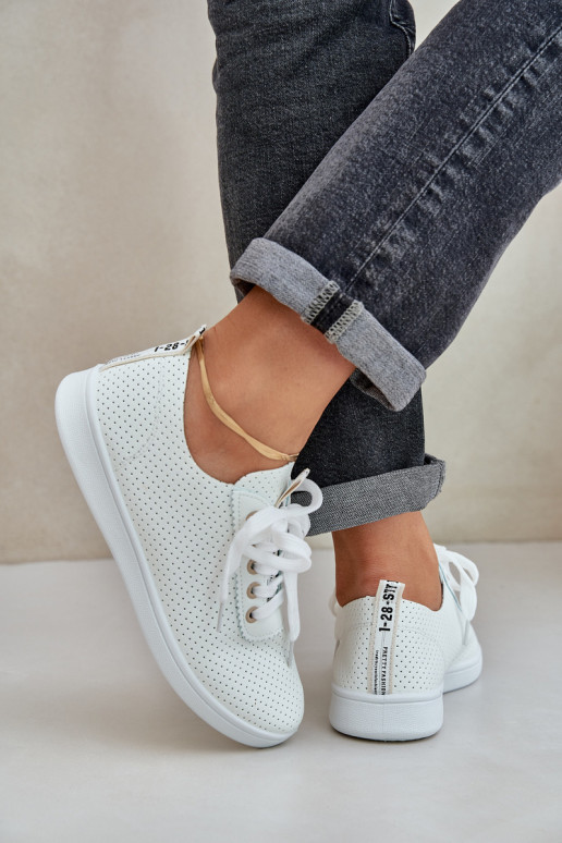 Moteriški ažūriniai suvarstomi sportbačiai dramblio kaulo spalvos Carinel