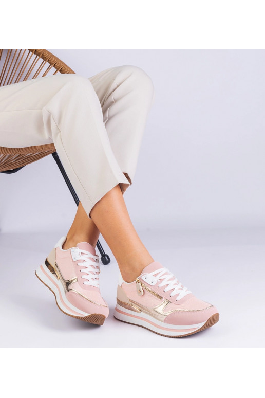 Rožiniai sportiniai sportbačiai ant...