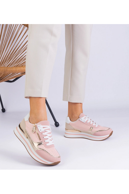 Rožiniai sportiniai sportbačiai ant...