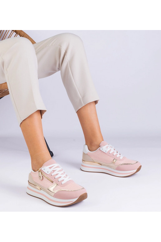 Rožiniai sportiniai sportbačiai ant...